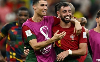 Fernandes double sends Portugal through to last 16