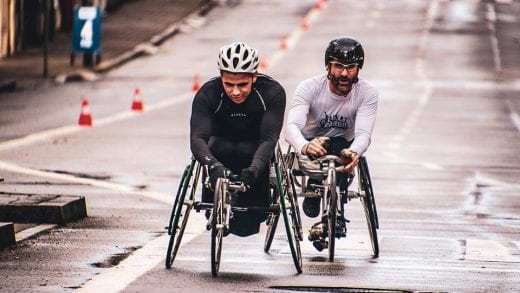 Image shows two disabled people racing