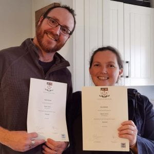 Dave Nicholls and his wife with their Master's certificates from Marjon University Cornwall
