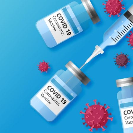 illustration of covid-19 vaccine bottles and a needle