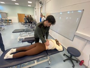 Student practicing treatments in the Osteopathy Clinic